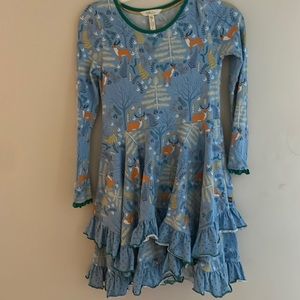 blue dress with animals, trees, etc.